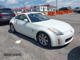 2003 Nissan 350Z Enthusiast with VIN JN1AZ34D03T105037, listed as a IAAI auction lot 42005367 with 218,687 mi miles. Bid and sale history available at carsss.com. Image 1.