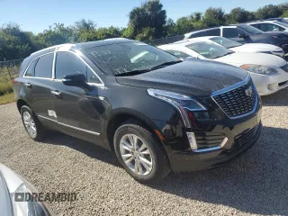2022 Cadillac XT5 FWD Luxury z VIN 1GYKNAR47NZ100986, wystawiony jako Copart lot #83144574 z przebiegiem Nie podano mil oraz Nie do naprawy • Non repairable. Historia ofert i sprzedaży dostępna na DreamBid. Obrazek 4.