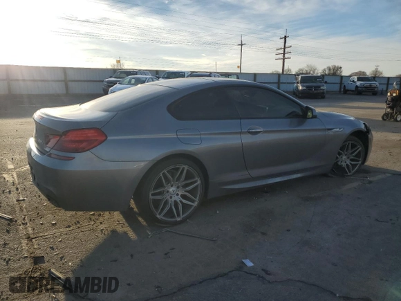 2015 BMW 6 Series 650i with VIN WBAYM9C53FD248356, listed as a Copart auction lot 85499554 with 115,292 mi miles and Salvage Title. Bid and sale history available at DreamBid. Image 3.