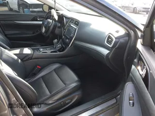 2017 Nissan Maxima SV with VIN 1N4AA6AP4HC404371, listed as a IAAI auction lot 41489579 with 117,677 mi miles. Bid and sale history available at carsss.com. Image 5.