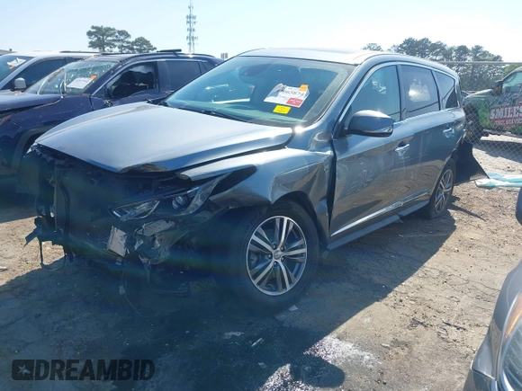 2019 Infiniti QX60 Luxe with VIN 5N1DL0MM7KC567051, listed as a IAAI auction lot 42065874 with 112,379 mi miles and . Bid and sale history available at DreamBid. Image 2.