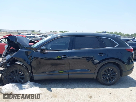 2021 Mazda CX-9 Touring with VIN JM3TCBCY8M0514905, listed as a IAAI auction lot 42385627 with 72,610 mi miles and . Bid and sale history available at DreamBid. Image 14.