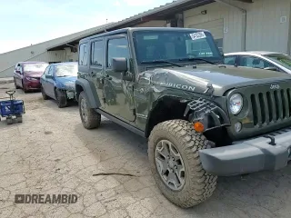 2015 Jeep Wrangler Unlimited Rubicon with VIN 1C4BJWFGXFL752602, listed as a Copart auction lot 54102395 with 26,466 mi miles and Salvage title. Bid and sale history available at DreamBid. Image 14.