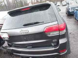 2014 Jeep Grand Cherokee Overland with VIN 1C4RJFCT2EC146239, listed as a IAAI auction lot 41368514 with 164,239 mi miles. Bid and sale history available at carsss.com. Image 16.
