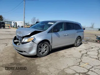 2013 Honda Odyssey EX z VIN 5FNRL5H41DB007033, wystawiony jako Copart lot #50140785 z przebiegiem Nie podano mil oraz Szkody całkowita. Historia ofert i sprzedaży dostępna na DreamBid. Obrazek 1.