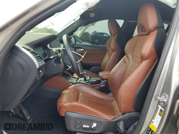 2020 BMW X3 M with VIN 5YMTS0C05LLT10643, listed as a Copart auction lot 62276834 with 39,860 mi miles and Salvage title. Bid and sale history available at DreamBid. Image 7.