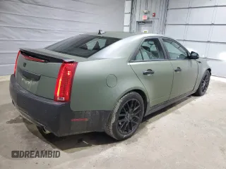 2011 Cadillac CTS Premium with VIN 1G6DS5ED9B0108868, listed as a Copart auction lot 48022825 with 128,624 mi miles and Salvage Title. Bid and sale history available at carsss.com. Image 3.