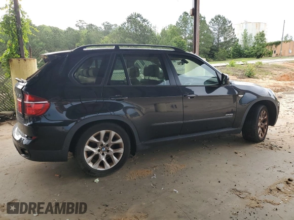 2012 BMW X5 35i with VIN 5UXZV4C54CL990112, listed as a Copart auction lot 59125245 with 142,742 mi miles and Clean title. Bid and sale history available at DreamBid. Image 3.