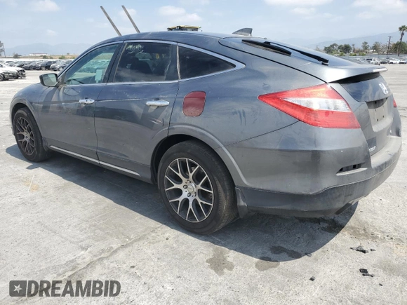 2013 Honda Crosstour EX-L z VIN 5J6TF1H59DL002040, wystawiony jako Copart lot #53917545 z przebiegiem 183 093 mil mil oraz Szkody całkowita. Historia ofert i sprzedaży dostępna na DreamBid. Obrazek 2.