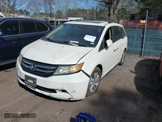 2016 Honda Odyssey EX-L with VIN 5FNRL5H62GB051628, listed as a IAAI auction lot 41911509 with 128,281 mi miles. Bid and sale history available at carsss.com. Image 17.