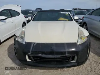 2014 Nissan 370Z Touring with VIN JN1AZ4FH8EM621259, listed as a Copart auction lot 77571454 with Not Provided miles and Salvage Title. Bid and sale history available at DreamBid. Image 5.