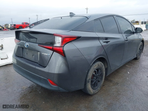2019 Toyota Prius L Eco with VIN JTDKARFU3K3099256, listed as a IAAI auction lot 41813619 with 169,900 mi miles. Bid and sale history available at carsss.com. Image 4.