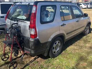 2005 Honda CR-V LX with VIN JHLRD68515C010897, listed as a Copart auction lot 43971785 with 257,429 mi miles and Clean Title. Bid and sale history available at DreamBid. Image 4.