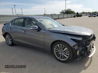 2024 Infiniti Q50 Luxe with VIN JN1EV7BP8RM600834, listed as a Copart auction lot 50489245 with 7,265 mi miles and Salvage title. Bid and sale history available at DreamBid. Image 4.