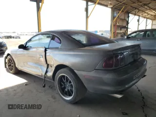 1997 Ford Mustang Cobra with VIN 1FALP47V8VF103811, listed as a Copart auction lot 56455324 with 129,499 mi miles and Salvage Title. Bid and sale history available at carsss.com. Image 2.