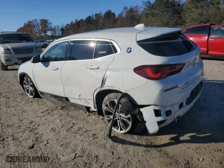2021 BMW X2 xDrive28i with VIN WBXYJ1C00M5S24107, listed as a Copart auction lot 81824504 with 29,376 mi miles and Salvage Title. Bid and sale history available at carsss.com. Image 2.