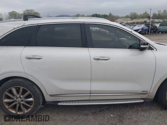 2016 Kia Sorento SX z VIN 5XYPKDA59GG113511, wystawiony jako IAAI lot #41997346 z przebiegiem 140 017 mil mil oraz . Historia ofert i sprzedaży dostępna na DreamBid. Obrazek 14.