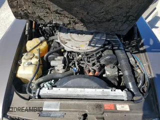 1987 Mercedes-Benz 560 with VIN WDBBA48D7HA063380, listed as a Copart auction lot 77820004 with 81,187 mi miles and Salvage Title. Bid and sale history available at carsss.com. Image 11.