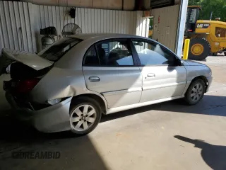 2002 Kia Rio with VIN KNADC123326133077, listed as a Copart auction lot 52427975 with 105,357 mi miles and Salvage Title. Bid and sale history available at carsss.com. Image 3.