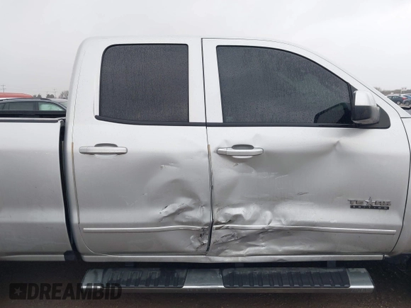 2018 Chevrolet Silverado 1500 LT with VIN 1GCRCREC4JZ287085, listed as a IAAI auction lot 41450057 with 79,275 mi miles and . Bid and sale history available at DreamBid. Image 13.