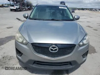 2014 Mazda CX-5 Sport with VIN JM3KE2BE1E0402185, listed as a Copart auction lot 52313675 with 140,398 mi miles and Salvage Title. Bid and sale history available at carsss.com. Image 5.