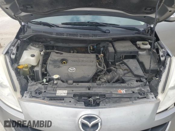 2013 Mazda 5 Sport with VIN JM1CW2BLXD0147334, listed as a Copart auction lot 47630605 with 149,625 mi miles and Salvage title. Bid and sale history available at DreamBid. Image 12.