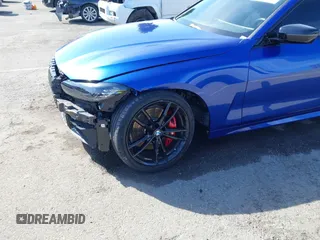 2024 BMW 4 Series M440i with VIN WBA53AT0XRCP39898, listed as a IAAI auction lot 41583884 with 2,212 mi miles and . Bid and sale history available at carsss.com. Image 20.