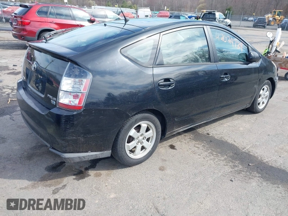 2005 Toyota Prius with VIN JTDKB20U253084443, listed as a IAAI auction lot 42024739 with 249,226 mi miles. Bid and sale history available at carsss.com. Image 4.