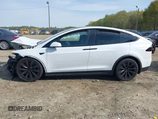 2022 Tesla Model X Plaid z VIN 7SAXCBE6XNF340704, wystawiony jako IAAI lot #41928524 z przebiegiem Nie podano mil oraz . Historia ofert i sprzedaży dostępna na DreamBid. Obrazek 14.