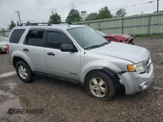 2008 Ford Escape XLT с VIN 1FMCU93128KE38301, выставлен на аукционе Copart как лот 59770315 с пробегом 194 619 миль миль и Списание • Salvage title. История ставок и продаж доступна на DreamBid. Изображение 4.