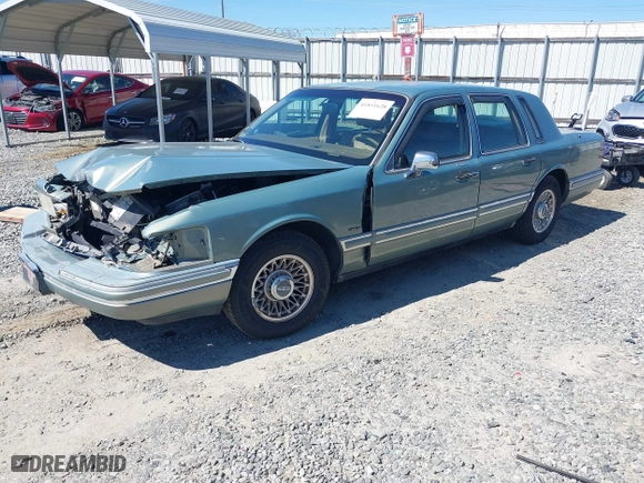 1994 Lincoln Town Car Signature with VIN 1LNLM82W5RY616904, listed as a IAAI auction lot 41811628 with 163,653 mi miles. Bid and sale history available at carsss.com. Image 17.