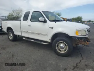 2001 Ford F-150 XL z VIN 1FTRX18L21NA29205, wystawiony jako Copart lot #58928795 z przebiegiem Nie podano mil oraz Szkoda całkowita • Salvage title. Historia ofert i sprzedaży dostępna na DreamBid. Obrazek 4.