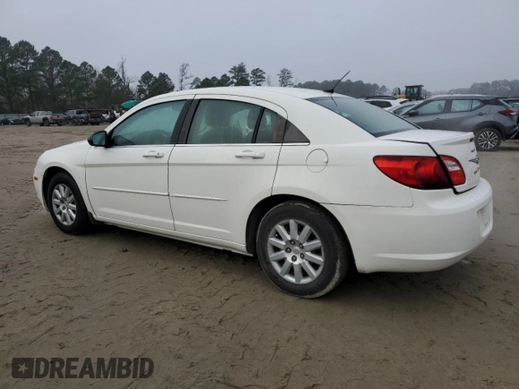 2010 Chrysler Sebring Touring with VIN 1C3CC4FB2AN162483, listed as a Copart auction lot 85229694 with 188,435 mi miles and Salvage Title. Bid and sale history available at carsss.com. Image 2.