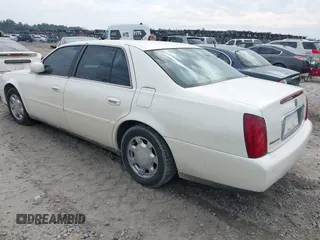 2000 Cadillac DeVille z VIN 1G6KD54Y2YU319515, wystawiony jako IAAI lot #41638065 z przebiegiem Nie podano mil oraz . Historia ofert i sprzedaży dostępna na DreamBid. Obrazek 3.
