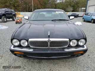 2003 Jaguar XJ VDP with VIN SAJDA24CX3LF55964, listed as a Copart auction lot 79812444 with 173,281 mi miles and Salvage Title. Bid and sale history available at carsss.com. Image 5.