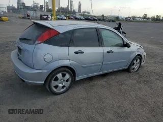 2007 Ford Focus S with VIN 1FAFP37N77W337626, listed as a Copart auction lot 70451294 with 174,068 mi miles and Salvage Title. Bid and sale history available at carsss.com. Image 3.