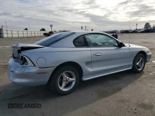 1996 Ford Mustang with VIN 1FALP4047TF106715, listed as a Copart auction lot 78658044 with 60,205 mi miles and Salvage Title. Bid and sale history available at carsss.com. Image 3.