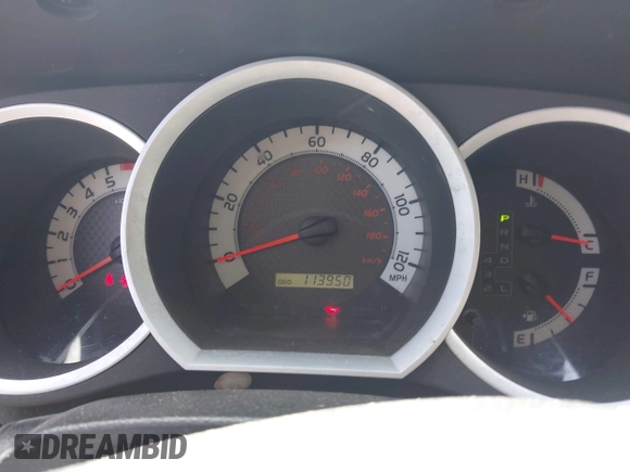 2014 Toyota Tacoma with VIN 3TMLU4EN3EM159080, listed as a IAAI auction lot 41809259 with 113,950 mi miles and . Bid and sale history available at DreamBid. Image 7.