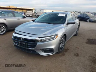 2021 Honda Insight Touring with VIN 19XZE4F99ME009749, listed as a IAAI auction lot 41411868 with 54,808 mi miles and . Bid and sale history available at carsss.com. Image 2.