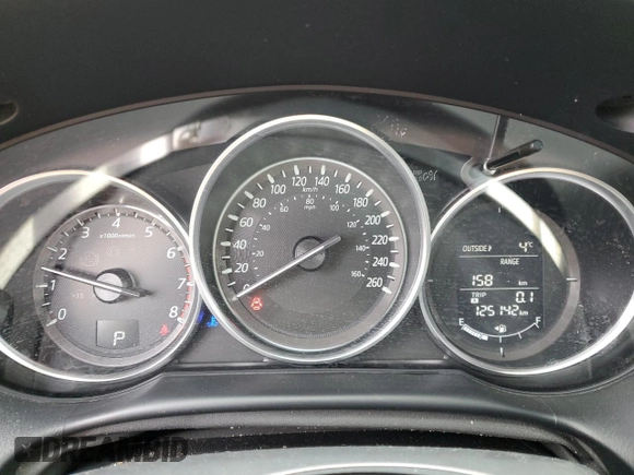2016 Mazda CX-5 Touring with VIN JM3KE4CY8G0610653, listed as a Copart auction lot 53390375 with 125,142 mi miles and Salvage Title. Bid and sale history available at carsss.com. Image 9.