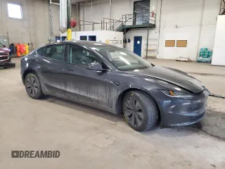 2024 Tesla Model 3 Long Range with VIN 5YJ3E1EBXRF818977, listed as a Copart auction lot 47303885 with 14,189 mi miles and Salvage Title. Bid and sale history available at DreamBid. Image 4.