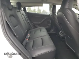 2023 Tesla Model 3 z VIN 5YJ3E1EA0PF504727, wystawiony jako Copart lot #53762135 z przebiegiem 17 554 mil mil oraz Szkoda całkowita • Salvage title. Historia ofert i sprzedaży dostępna na DreamBid. Obrazek 11.