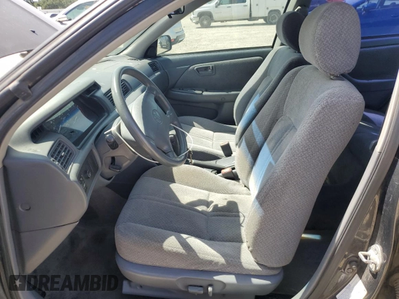 2001 Toyota Camry CE z VIN 4T1BG22K61U780042, wystawiony jako Copart lot #58605455 z przebiegiem 163 833 mil mil oraz Szkoda całkowita • Salvage title. Historia ofert i sprzedaży dostępna na DreamBid. Obrazek 7.