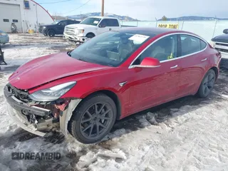 2018 Tesla Model 3 Long Range Battery with VIN 5YJ3E1EB0JF064041, listed as a IAAI auction lot 41562239 with 54,720 mi miles and . Bid and sale history available at DreamBid. Image 2.