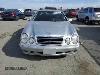 2000 Mercedes-Benz CLK 320/430 with VIN WDBLJ65G8YF122308, listed as a Copart auction lot 77449314 with 105,121 mi miles and Salvage Title. Bid and sale history available at DreamBid. Image 5.