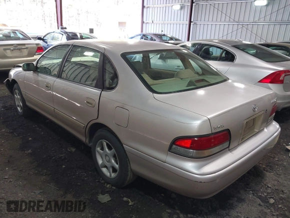 1997 Toyota Avalon XL with VIN 4T1BF12BXVU163858, listed as a IAAI auction lot 41486234 with 228,917 mi miles and . Bid and sale history available at DreamBid. Image 3.