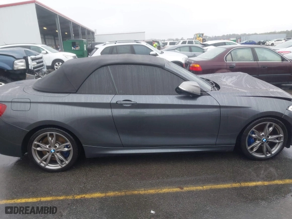 2015 BMW 2 Series M235i with VIN WBA1M1C50FV393092, listed as a IAAI auction lot 41507537 with 79,321 mi miles. Bid and sale history available at carsss.com. Image 13.