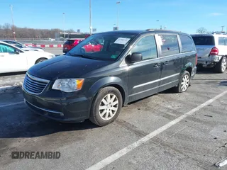 2016 Chrysler Town & Country Touring with VIN 2C4RC1BG7GR231704, listed as a IAAI auction lot 41306140 with 165,890 mi miles. Bid and sale history available at carsss.com. Image 17.