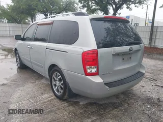 2014 Kia Sedona EX with VIN KNDMH4C74E6578326, listed as a IAAI auction lot 41990311 with 220,772 mi miles. Bid and sale history available at carsss.com. Image 3.