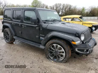 2023 Jeep Wrangler Sahara z VIN 1C4JJXP62PW514489, wystawiony jako Copart lot #51811585 z przebiegiem 39 174 mil mil oraz Szkoda całkowita • Salvage title. Historia ofert i sprzedaży dostępna na DreamBid. Obrazek 4.